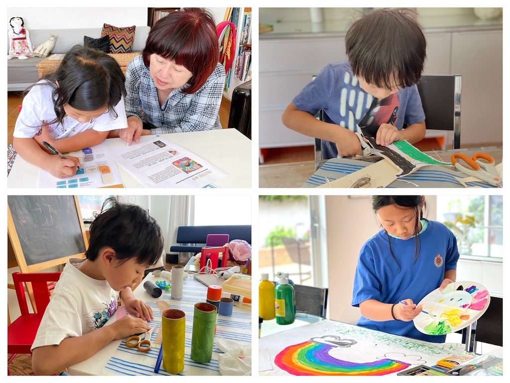 Kids working on summer craft projects.