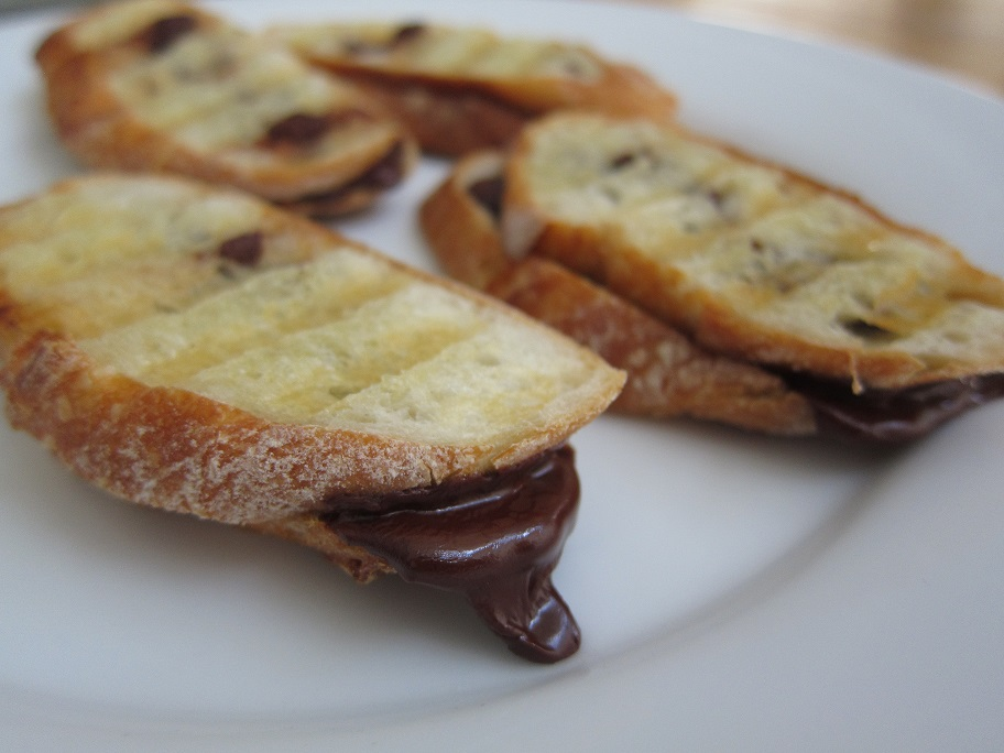 Chocolate panini is made with baguettes and chocolate, grilled to melting.