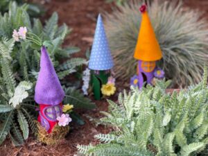 Fairy house is made with toilet paper rolls and felt or cardstock.