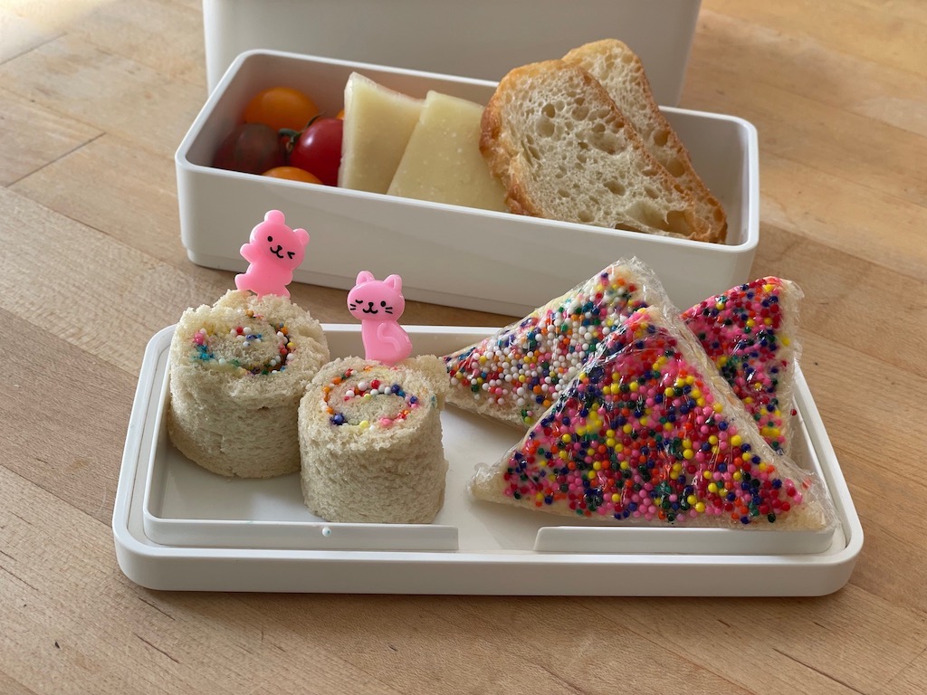 A sampling of Fairy Bread. Two variations: pinwheels and traditional triangles.