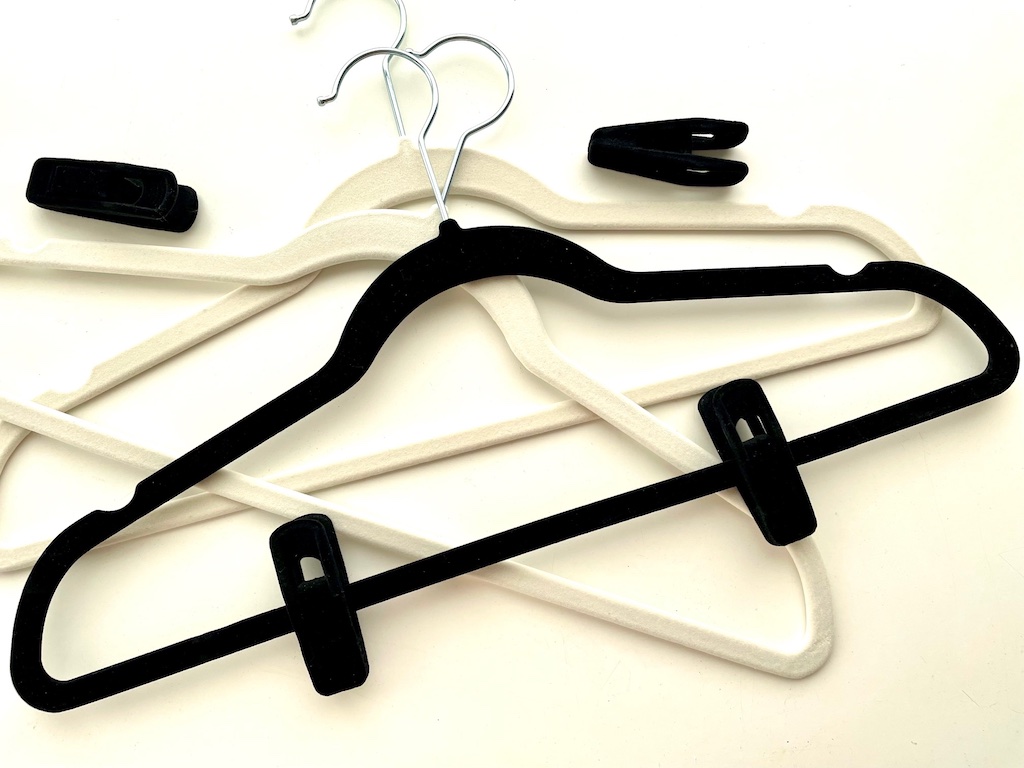 Velvet hangers and velvet hanger clips will give you more space in the closet.