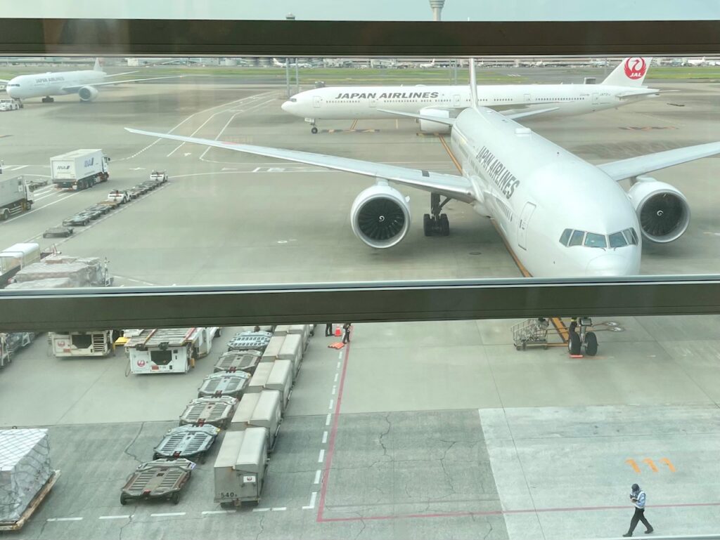 Japan Airlines planes on the tarmac at Haneda Airport, Tokyo.