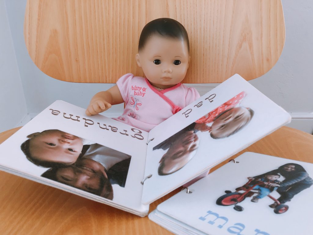 For this DIY Christmas gift, take photos of people and objects familiar to the child and use them to make a board book.