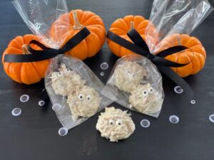 White baking chips are used to make these Halloween candy ghosts.