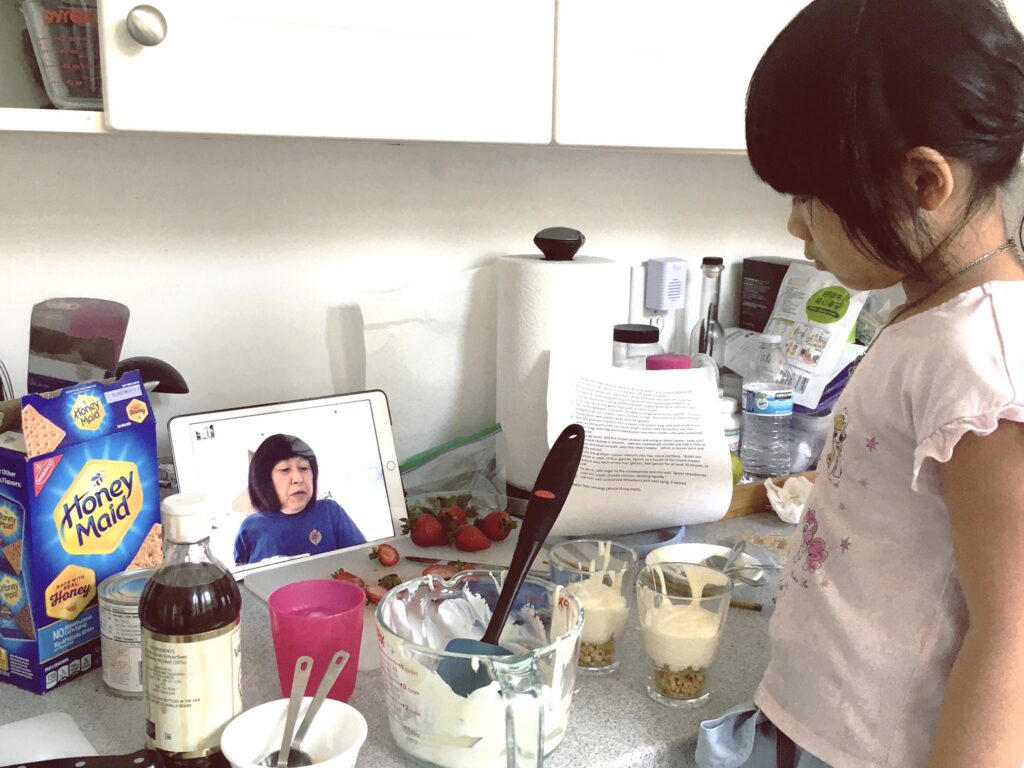 You can cook together even when apart. Child gets lessons for making a strawberry dessert on FaceTime with grandma.