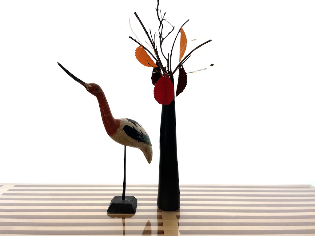 This sample of a thankful tree is made with a few bare branches in a tall vase and leaves cut from construction paper.