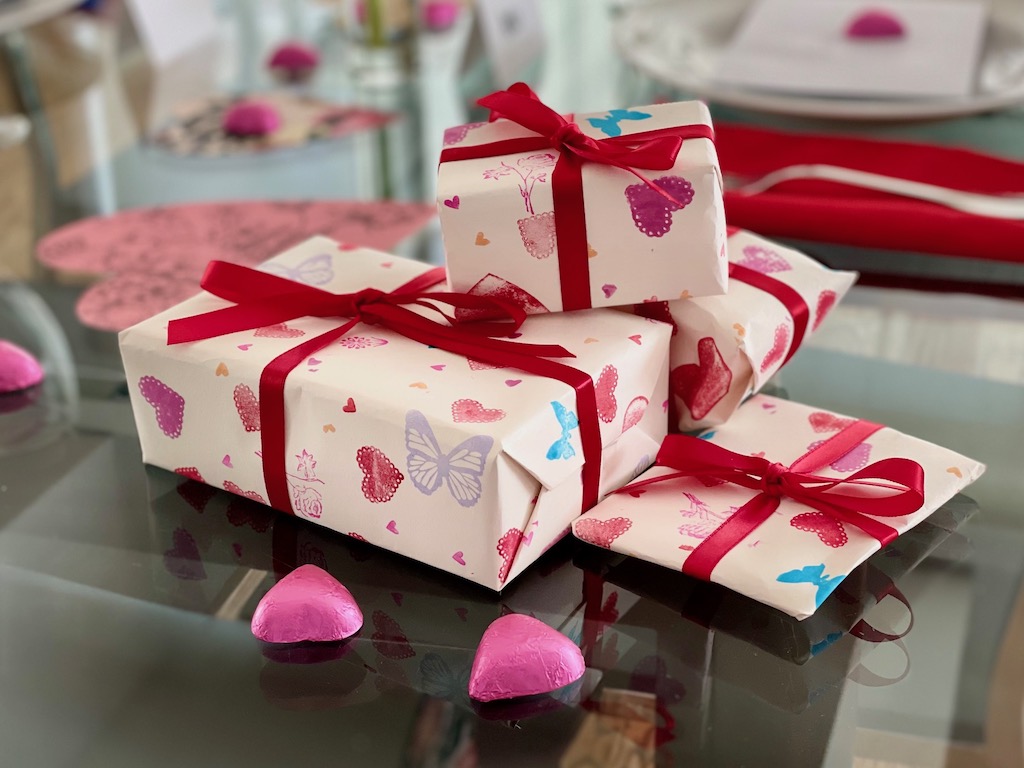 Small gifts for every family member are stacked for distribution after dinner.