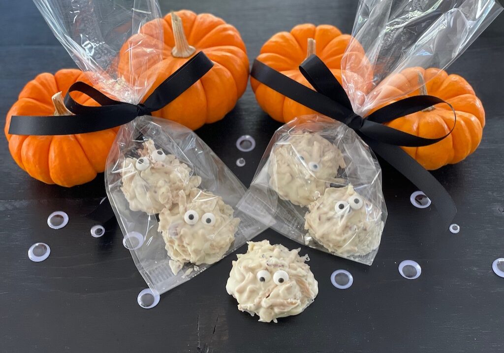 White baking chips are used to make these Halloween candy ghosts.